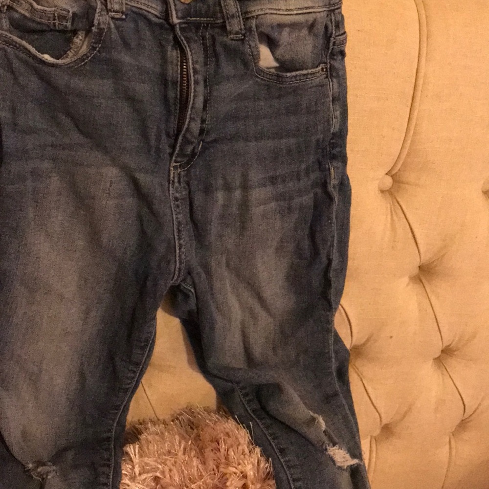 Mid rise blue jeans